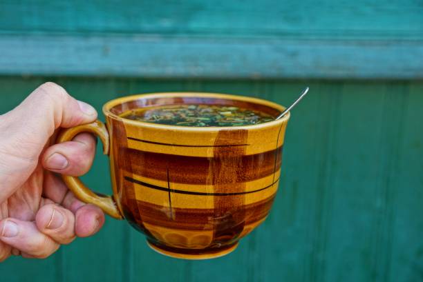 Herbal tea served in a ceramic mug at ideal drinking temperature